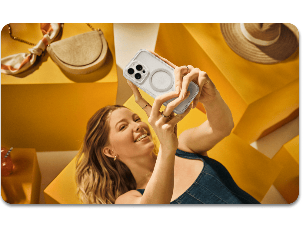 woman laying down taking a selfie with a thin clear iPhone case